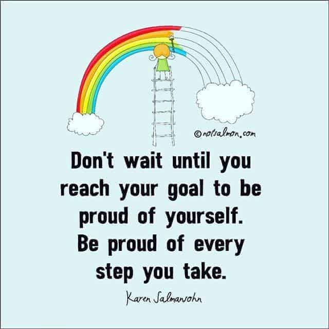 Be proud of yourself. Girl painting rainbow. Standing on ladder, half done.